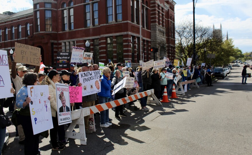 No Kings protestors lined up on Princess Street shouting and chanting.