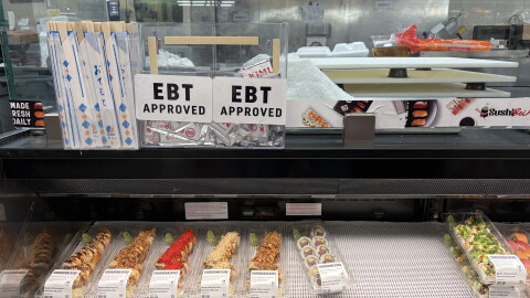 An Electric Benefits Transfer, or EBT, sign lets patrons know the benefit is approved at this Oklahoma City grocery store.