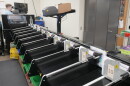 FILE - Vote-by-mail envelopes are sorted at the Shasta County Registrar of Voters office in Redding, Calif., Tuesday, Feb. 20, 2024.