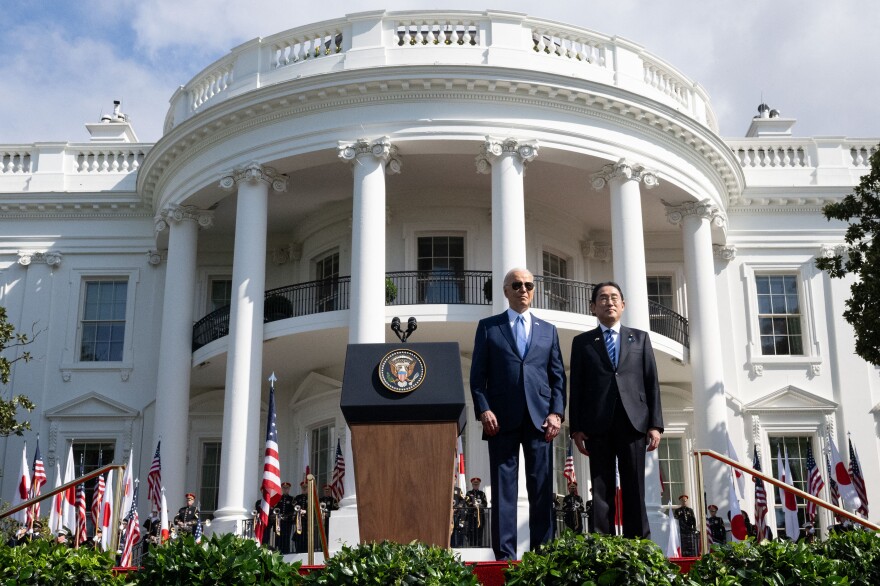 President Biden and Japanese Prime Minister Fumio Kishida stand together during a state visit ceremony at the White House.
