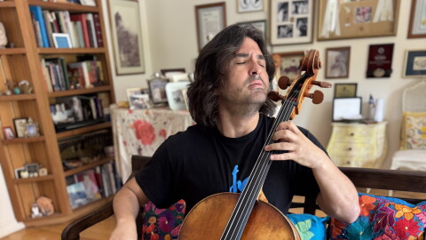 Diego Carneiros plays the cello ahead of his concert for peace in Santa Barbara