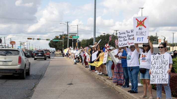 A large crowd gathers along Valley Mills in front of the Westview Shopping Center as part of the No Kings Protest on Saturday, October 18, 2025.