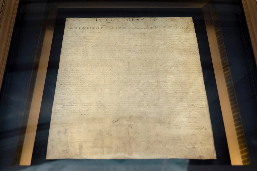 FILE - The Declaration of Independence is displayed at the National Archives on Sept. 16, 2025, in Washington, as the Archives unveiled a display for the first time of the entire Constitution and all 27 amendments as part of celebrations for the upcoming 250th anniversary of founding of the United States. (AP Photo/Mark Schiefelbein, File)