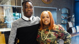 Angela Cross stands with her son Cyrus Nance who was expelled for cursing at a basketball coach at American Heritage. 