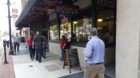 Pictured: Downtown workers take to the streets during lunchtime. 