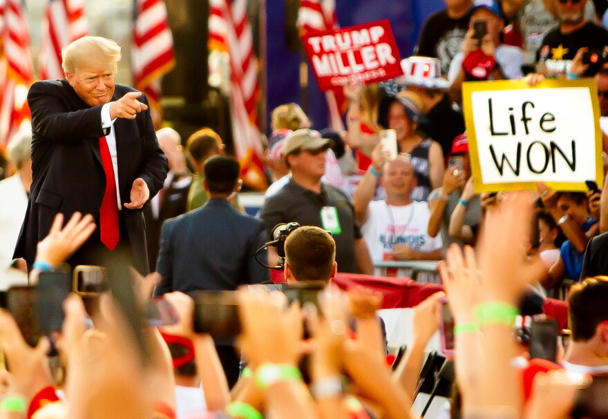 Former President Donald Trump gestures towards the crowd on Saturday, June 25, 2022, at a “Save America!” Rally at the Adams County Fairgrounds in Mendon, Ill. “Your boundless love, sacrifice and devotion has finally been rewarded in full,” Trump told his thousands of supporters regarding the overturning of Roe v. Wade the day after the decision. “As a candidate in 2016, I promised to nominate judges and justices who would stand up for the original meaning of the Constitution and who would honestly and faithfully interpret the law as written.”