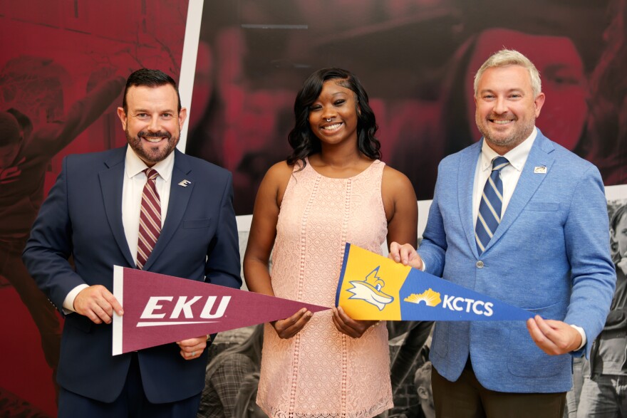 EKU President Dr. David McFaddin, EKU Graduate and KCTCS transfer student Kahlilah Mitchell, and KCTCS President Ryan Quarles.