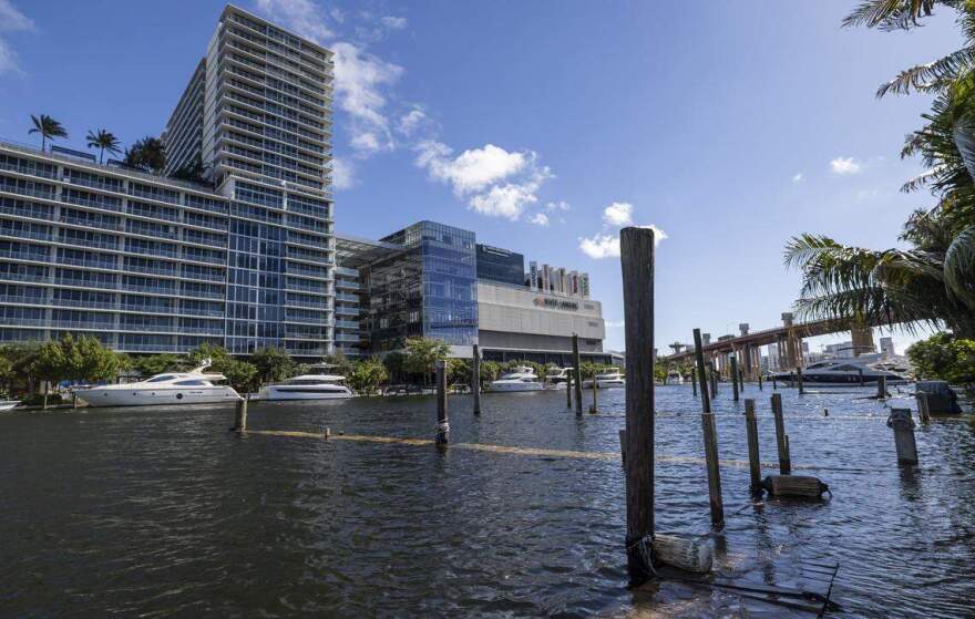 Docks are underwater on the Miami River as king tide rises near Grove Park on the morning of Wednesday, Oct, 8, 2025, in Miami, Fla. Photo by Matias J. Ocner mocner@miamiherald.com