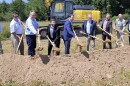 Officials stage a ceremonial groundbreaking for the expansion of Oswego County's industrial park in Phoenix.