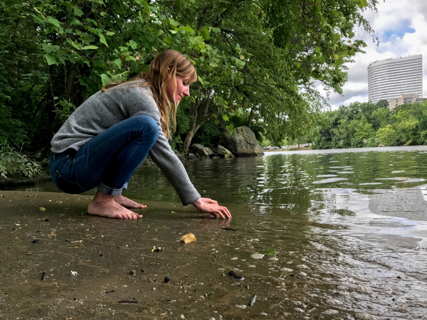 Clare Kelley practices "forest bathing" along the edge of an urban forest on Roosevelt Island, in the middle of the Potomac River. In contrast to hiking, forest bathing is less directed, melding mindfulness and nature immersion to improve health.