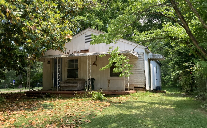 Anniston home during car tour with activist David Baker