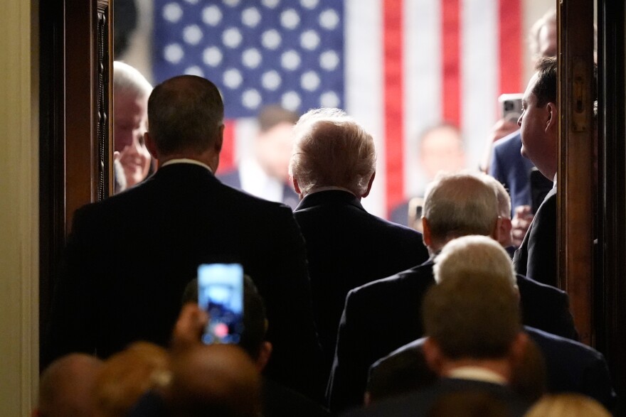 President Donald Trump arrives to deliver the State of the Union address to a joint session of Congress in the House chamber at the U.S. Capitol in Washington, Tuesday, Feb. 24, 2026. (AP Photo/Mark Schiefelbein)