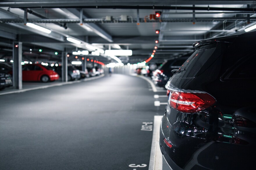 Underground garage or modern car parking with lots of vehicles