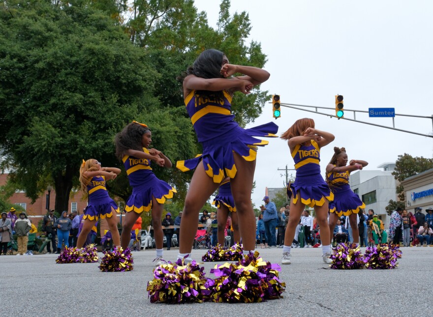 Benedict College's cheerleading squad performs on Sumter Street in downtown Columbia, S.C., during the school's homecoming parade on Oct. 29, 2022.