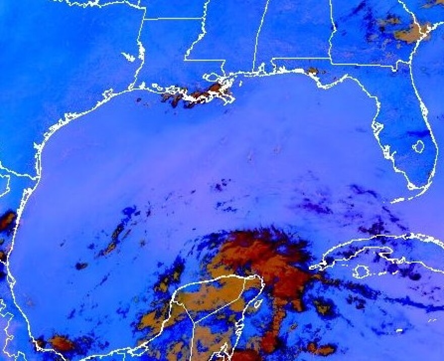 NOAA satellite image shows Saharan dust over the gulf in very light pink on Aug. 12, 2026