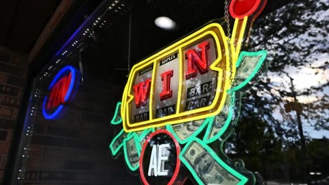 A sign advertises slot machines at a video gaming cafe in west suburban Oakbrook Terrace.