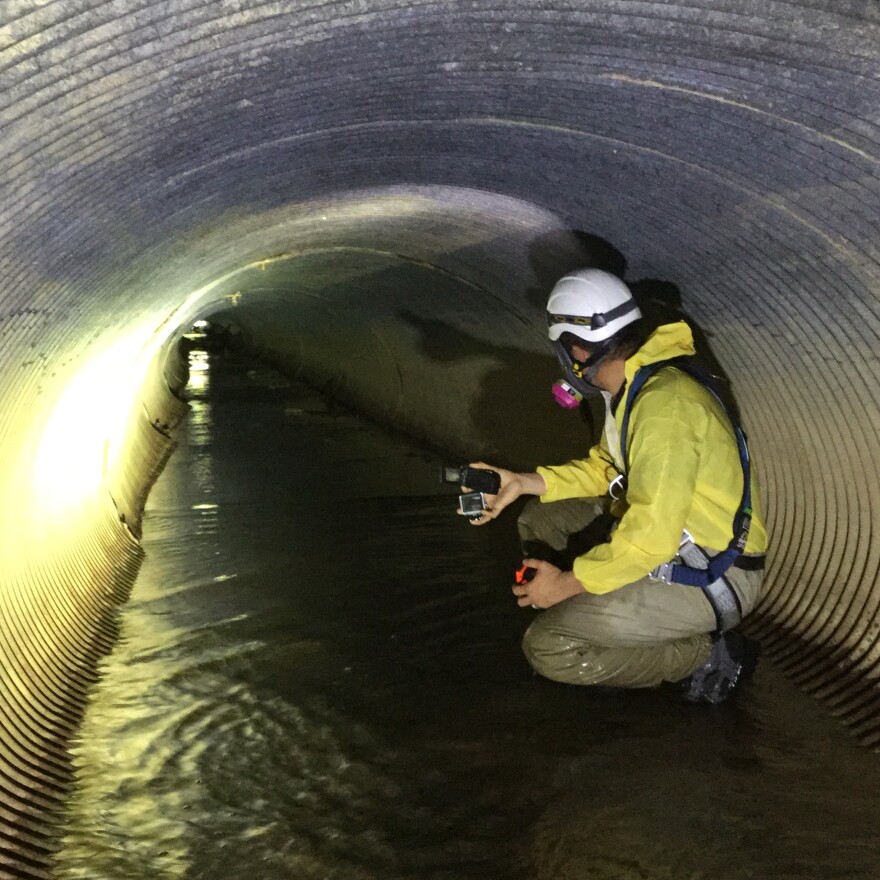 A photo of a man working in a sewer tunnel. Provided by the Northeast Ohio Regional Sewer District.