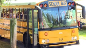 A law that went into effect earlier this year makes says drivers caught illegally passing stopped school buses can face penalties including fines of up to $5,000 or have their license suspended for up to a year.
