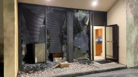 Storefront damaged during protest