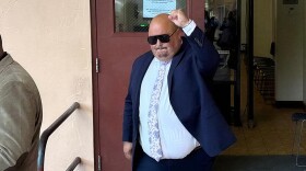 Pictured: Brett “Mac” McClafferty raises his hand while exiting Magistrate Court on St. Thomas after Judge Julie Smith-Todman tightened his pretrial release restrictions related to posting on social media.