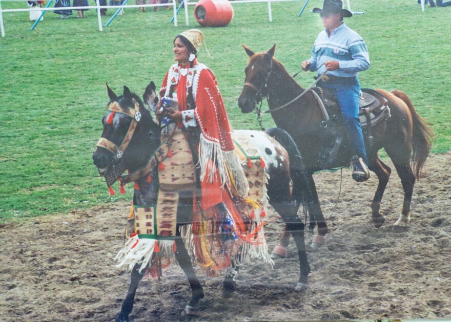 At the 1996 Pendleton Round-up, Pinkham entered the arena on a Nez Perce tribal Arabian Appaloosa horse who she trained. The horse’s regalia is woven dog bane and corn husk. Photo of photo by Richard Storch.