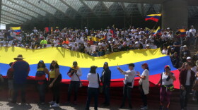 Hundreds march in Mexico City asking for Mexico's support in Venezuela's humanitarian crisis. (Rodrigo Cervantes/KJZZ)
