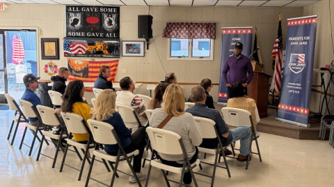 Representative John James speaks to veterans and others in Grand Haven.