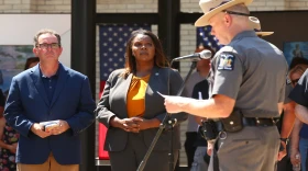 MICHAEL OKONIEWSKI /NYS FAIR Interim NYS Fair Director Sean Hennessey and NYS Attorney General Letitia James listens as the names of the fallen are read during ceremonies to honor law enforcement at the NYS Fair on Monday Aug. 29, 2022.