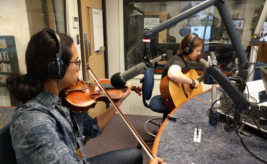 Barton Stanley David (right) and violin accompanyist Leon Carlo (left) performed live at KETR.