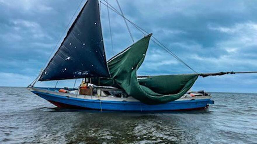 A sailboat floats in the shallow water off Card Sound Road in Key Largo