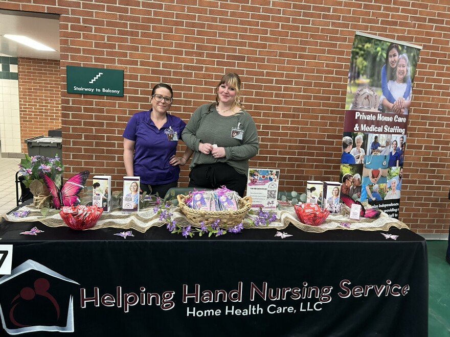 Kelsey McMillon (left) and MacKenzie Taylor (right) of Helping Hand Nursing Service at the Great Lakes Bay Employment Job Fair in Saginaw on April 9th, 2026