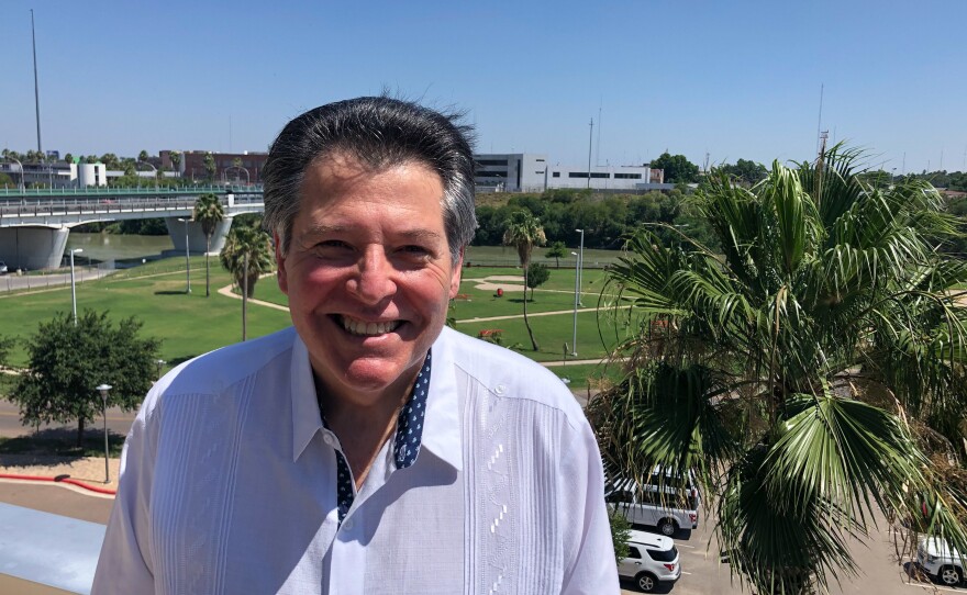 Laredo Mayor Pete Saenz is against a border wall in the riverside park pictured behind him, but if the feds move ahead he hopes they'll build a more eye-pleasing concrete bulkhead.