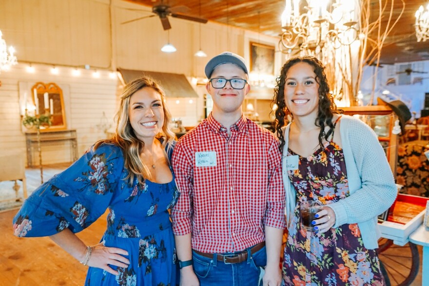 Academy Head of School Beth Spear, left, with recent graduate Kason Kolka and Speech Language Pathologist Assistant Alie Wallace