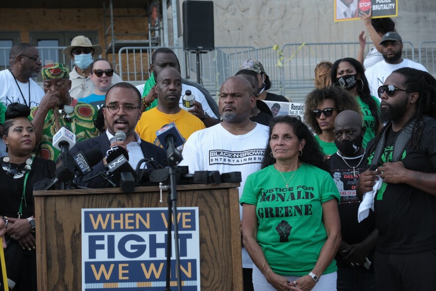 Attorney Ronald Greene speaks at a rally seeking justice for Ronald Greene, who died in Louisiana State Police Custody in May, 2019. Greene's Mother, Mona Hardin stands by.