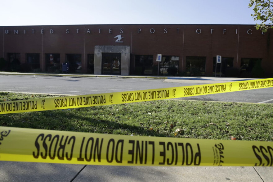 Police tape cordons off a post office in Wilmington, Del., Thursday, Oct. 25, 2018.  A law enforcement official said suspicious packages addressed to former Vice President Joe Biden were intercepted at Delaware mail facilities in New Castle and Wilmington and were similar to crude pipe bombs sent to former President Barack Obama, Hillary Clinton and CNN. (Matt Rourke/AP)