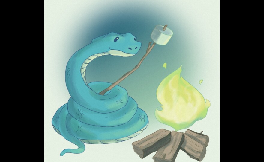 A blue snake roasts a marshmallow over a fire