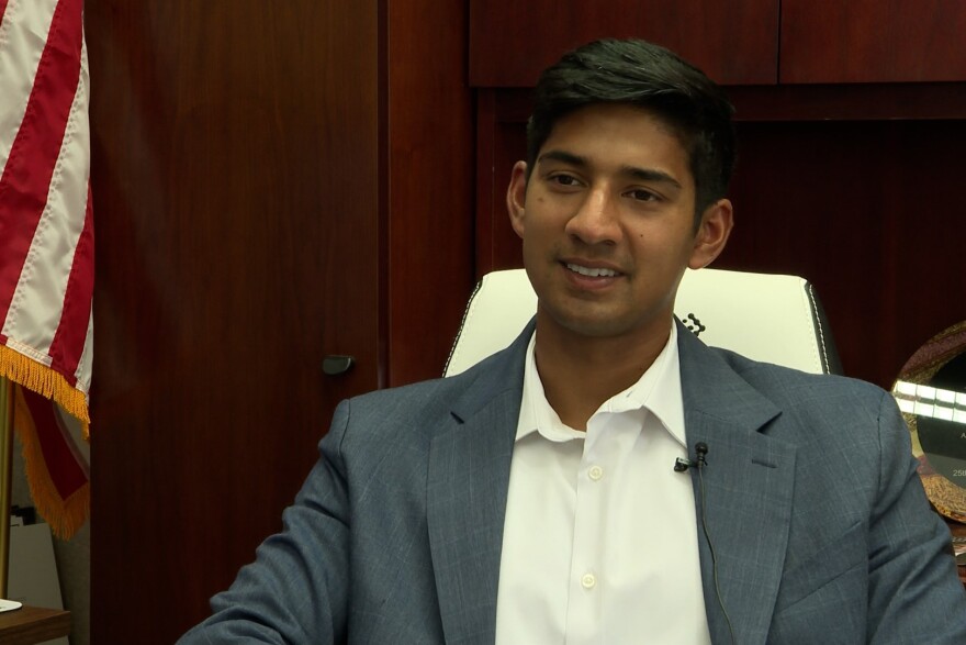 Mayor Sakbun sits at his desk.