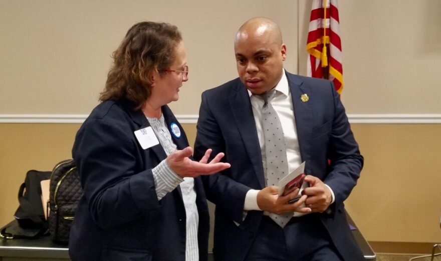 Shirley Mata, left, speaks with MIchael Butler after they were elected Saturday to lead the Missouri Democratic Party. Butler will be party chairman for another two years and Mata will be vice-chair. (Rudi Keller/Missouri Independent)