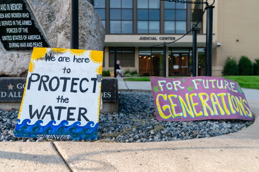 Protest signs sit outside the Aitkin County Courthouse during the trial of Mylene Vialard, a protester of Enbridge Line 3, on Aug. 30, 2023, in Aitkin.