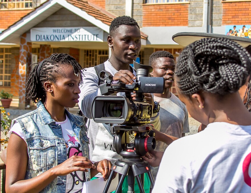 Maxwell Odhiambo (center, holding camera) had one week to make a movie.