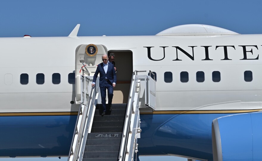 President Joe Biden walks down the steps of Air Force One after landing at the Wilkes-Barre/Scranton International Airport on Tuesday afternoon.