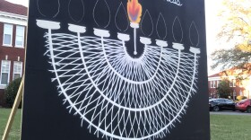 Artist and Queens professor, Mike Wirth, drew inspiration for his menorah design from the late Supreme Court justice Ruth Bader Ginsburg.