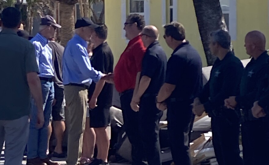President shaking hand