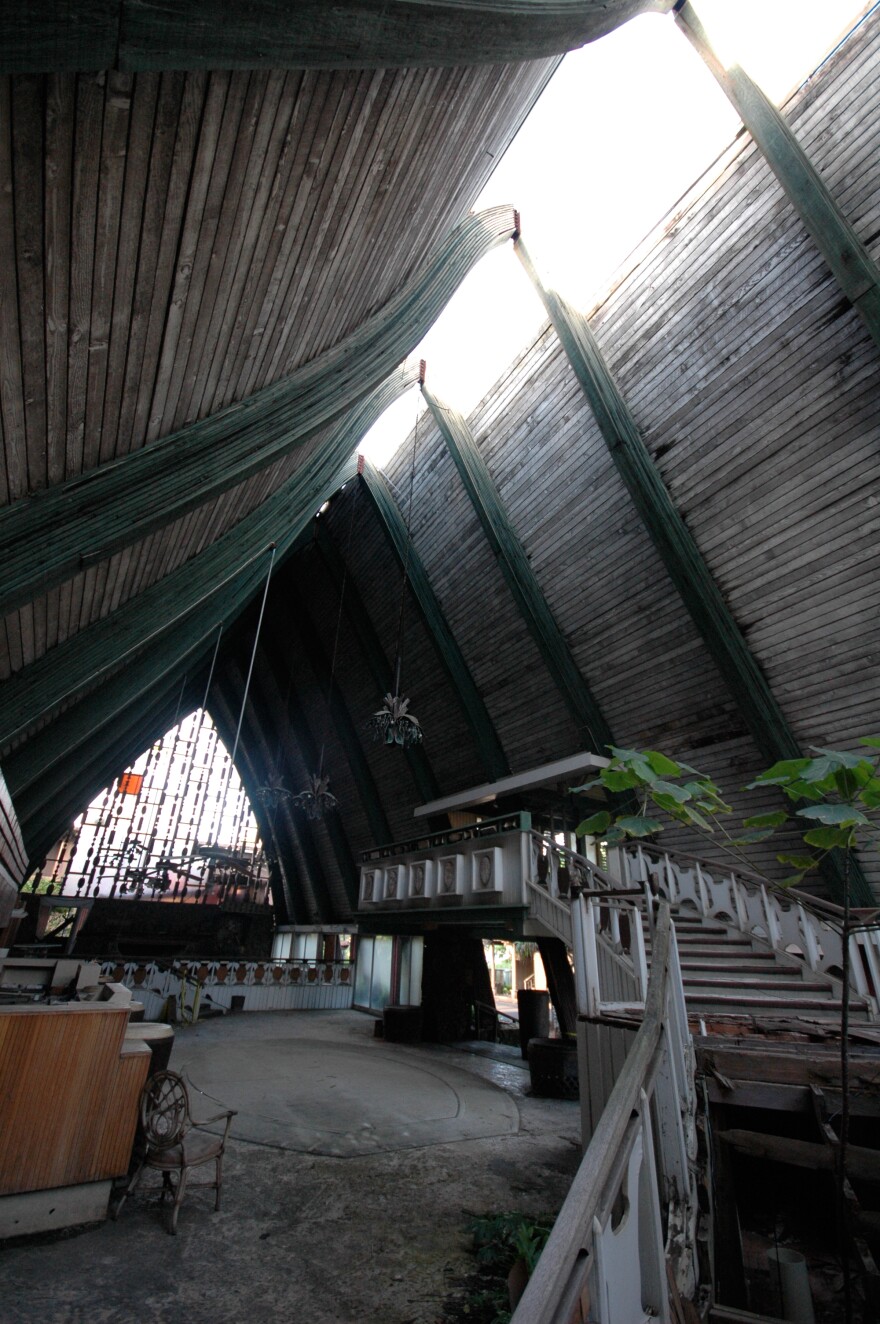 In this 2008 image, the lobby of the Coco Palms Resort sits empty years after Hurricane ʻIniki crossed the island.