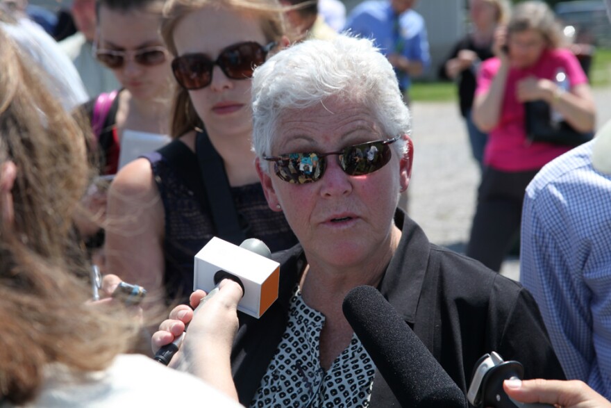 EPA Administrator Gina McCarthy speaks to reporters while on a farm tour in Rocheport, Mo., in 2014.