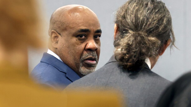 Duane Davis, center, chats with his attorney Michael Sanft during the fourth day of jury selection for his murder trial in Clark County District Court at the Regional Justice Center on Thursday, Aug. 13, 2026, in Las Vegas. Davis was indicted on murder charges for his involvement in the killing of rapper Tupac Shakur in 1996. (Bizuayehu Tesfaye/Las Vegas Review-Journal via AP, Pool)
