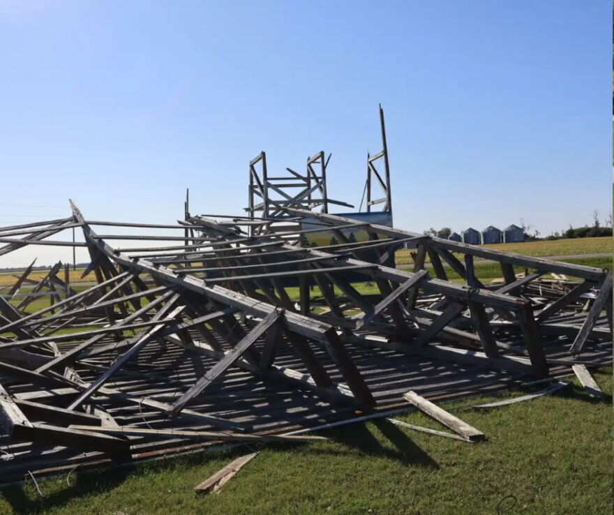 A chunk of the screen is on the ground at Sky-Vu in Warren, Minn., on Sunday | MPR News