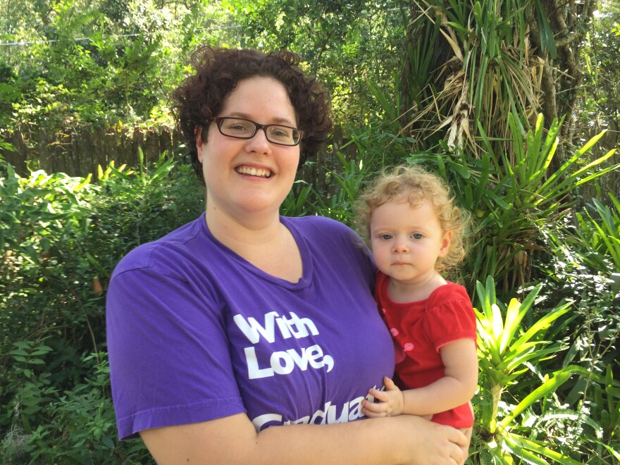 Second year UF Masters student Rebecca Pethes with her daughter Isobel