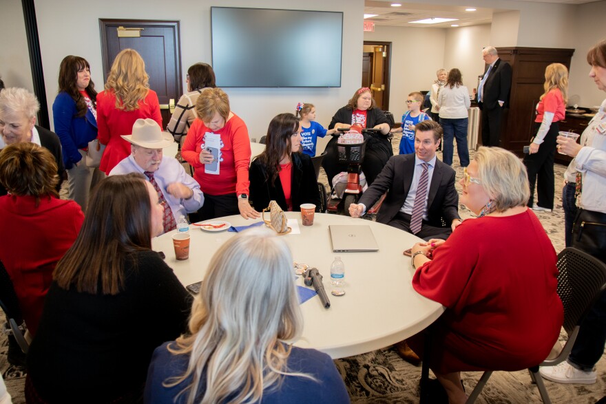 Sen. Adam Pugh (R-Edmond), Rep. Mark McBride (R-Moore) and Sen. Carri Hicks (D-Oklahoma City) speak with public school supporters during National Public Schools Week.