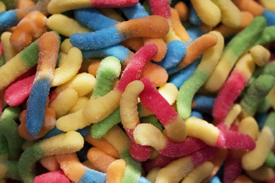 Gummy worms, containing 10 milligrams of cannabidiol, are displayed at the Cannabis World Congress & Business Exposition trade show, Thursday, May 30, 2019 in New York. The non-high inducing treats, made from hemp, are made by THP of Hollywood, Flor.